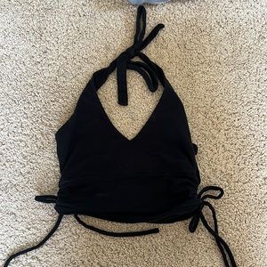 Black halter tank, around the neck